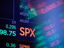 Monitors show stock market information on the floor of the New York Stock Exchange.