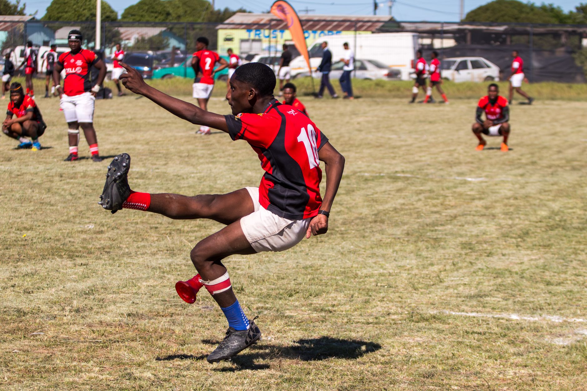 Dynamic photo of a youth rugby match with players in action, showcasing athletic skill. — How to Choose Sports Tickets for Yo